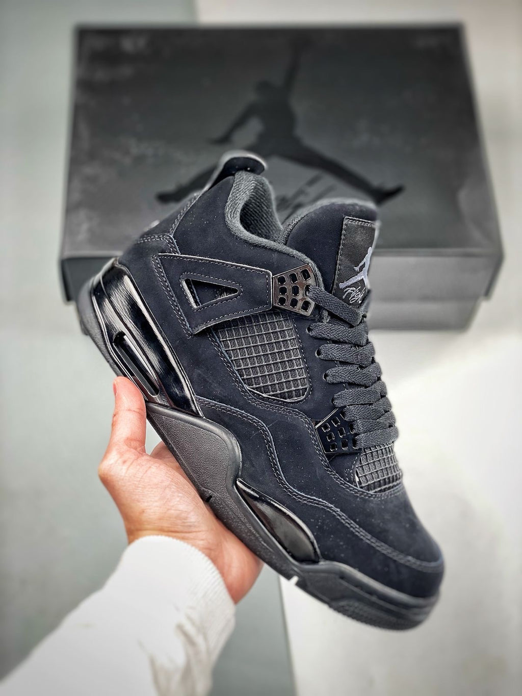 Air Jordan 4 Retro “Black Cats”