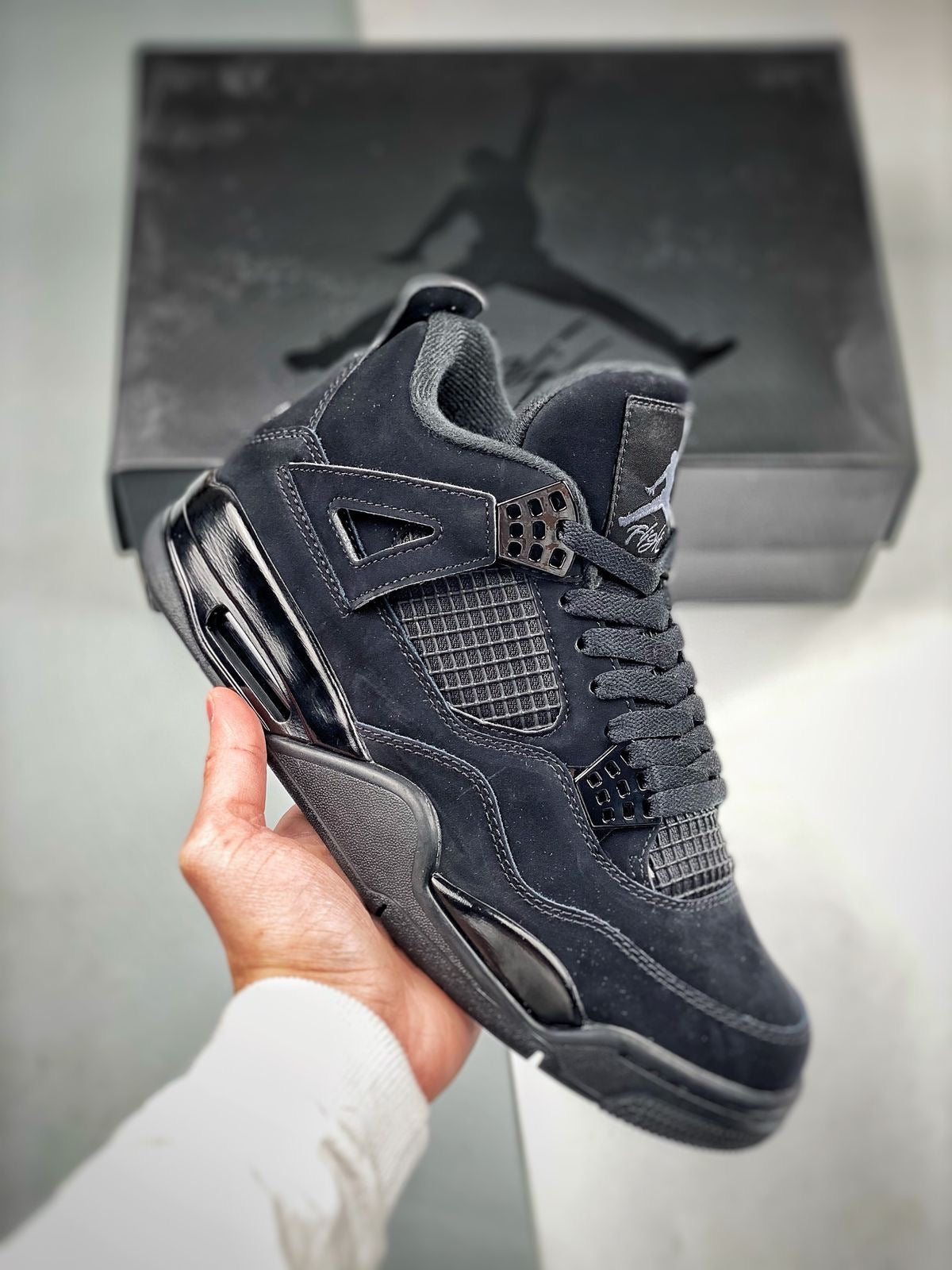 Air Jordan 4 Retro “Black Cats”